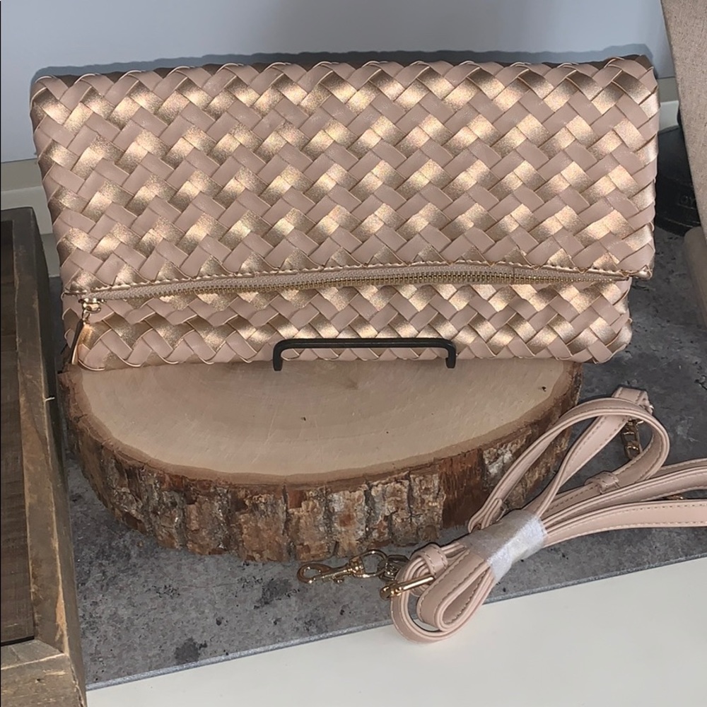 New Sole Society rose gold clutch.